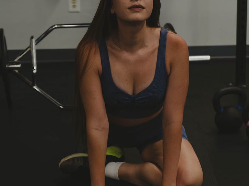Person practicing a focused, calm exercise indoors.